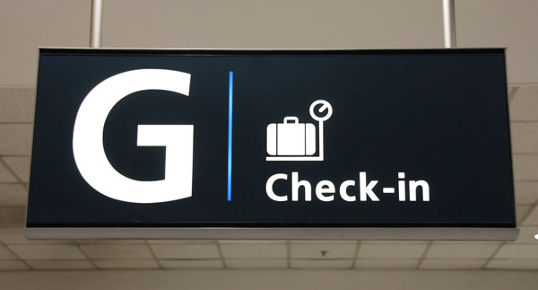 Check-in sign at Sydney Airport